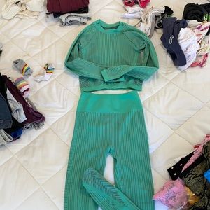Fabletics green crop top, leggings, sports bra